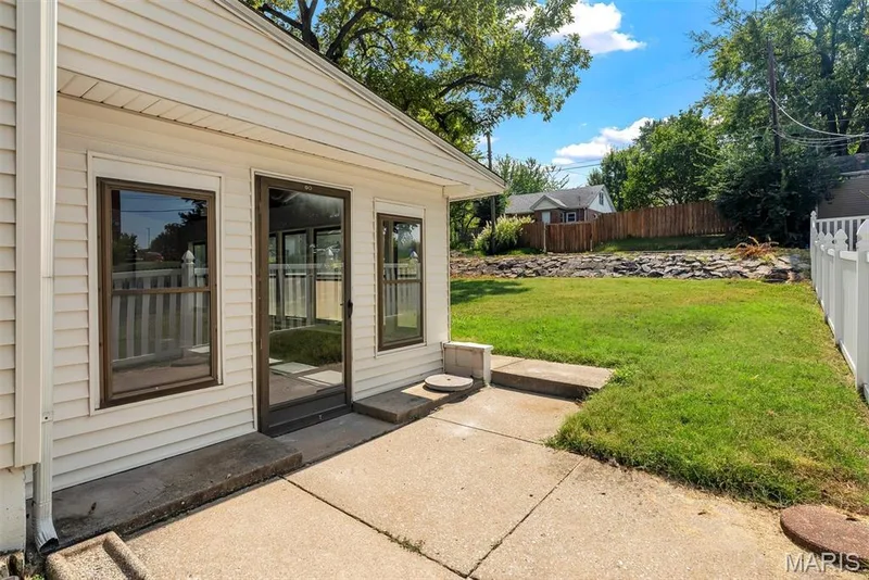 Backyard access from enclosed patio. — 1165 Jackson Street, St Charles, MO 63301