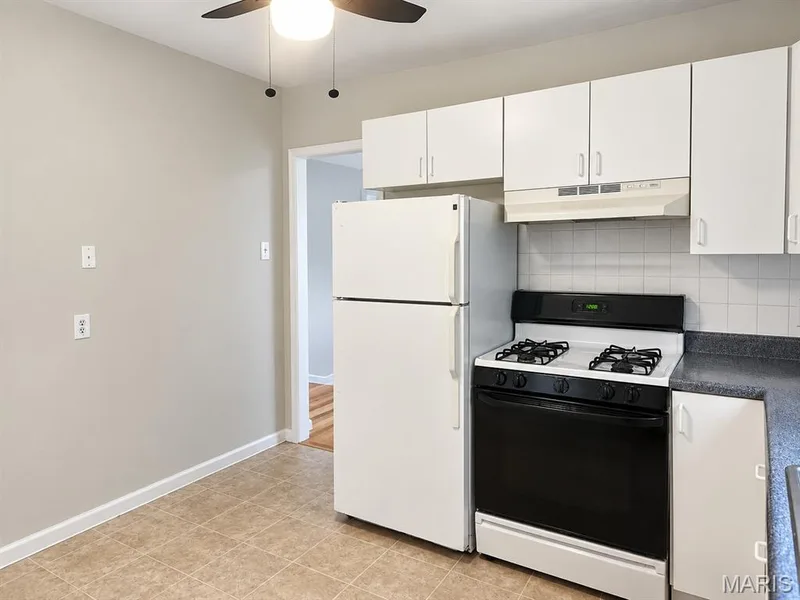 416 Kitchen. New cabinet fronts in 2026 — 414-416 S Cadillac Drive, St Charles, MO 63301