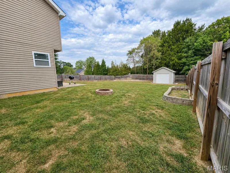 Fire pit for a fall night bonfire — 2548 Autumn Fields Lane, Wentzville, MO 63385