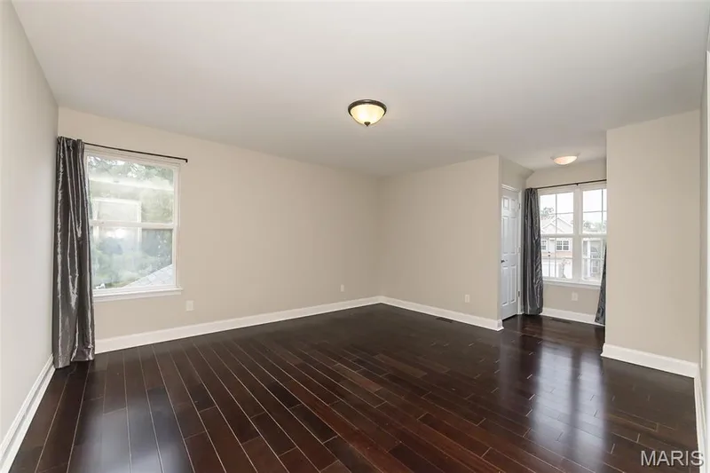 Extra large Front Bedroom with direct bath access, wood floors, double closets and great light. — 472 Brookhaven Court, O'Fallon, MO 63368