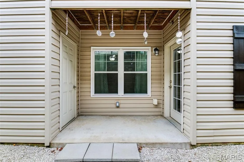 Back patio with private storage — 312 Bramblett Hills, O'Fallon, MO 63366