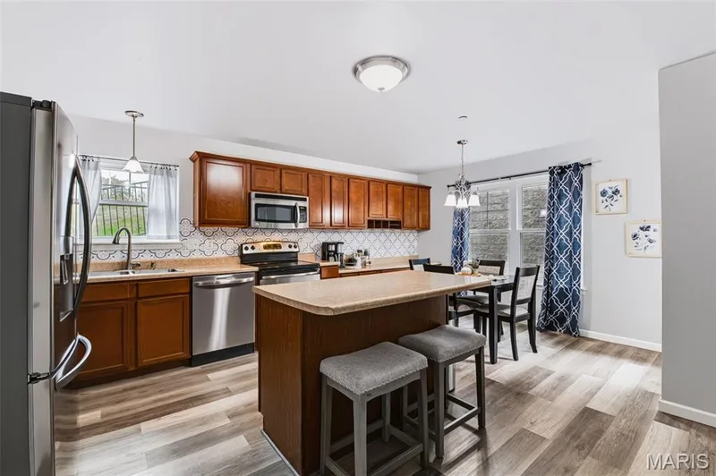 Kitchen with island — 312 Bramblett Hills, O'Fallon, MO 63366
