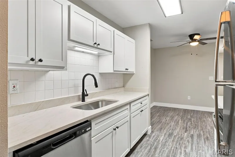 View from Kitchen to Dining Room — 2415 Sandalwood Creek Court #C, Wildwood, MO 63038