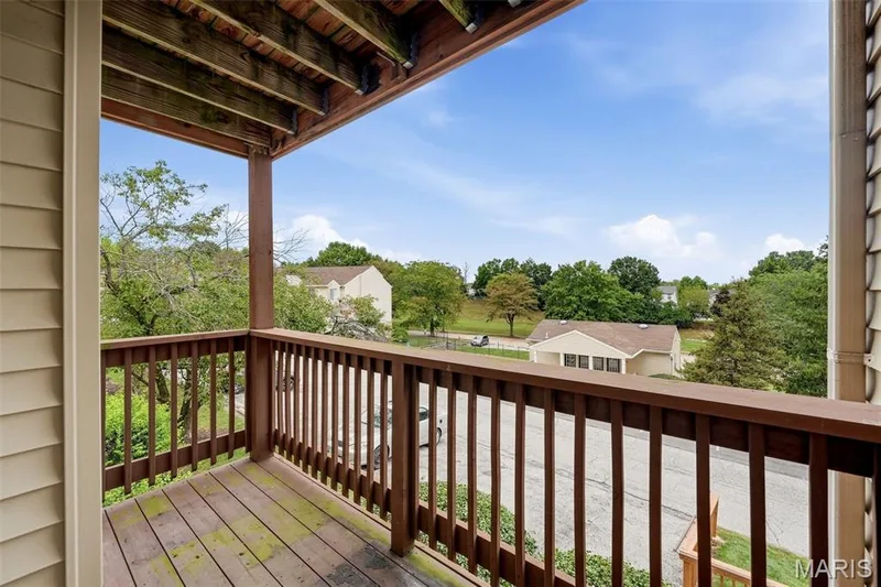Private wood deck with wood railing — 2415 Sandalwood Creek Court #C, Wildwood, MO 63038