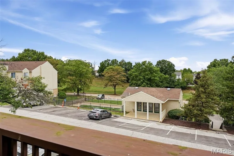 Deck looks out towards pool — 2415 Sandalwood Creek Court #C, Wildwood, MO 63038