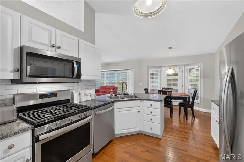 Newer stainless appliances in kitchen — 2169 Farnsworth Drive #1424A, O'Fallon, MO 63368