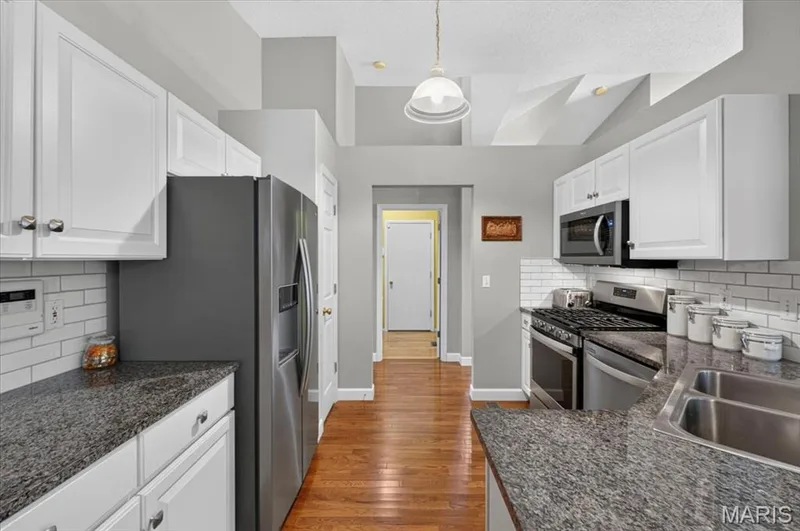 Pantry in kitchen for addtional storage — 2169 Farnsworth Drive #1424A, O'Fallon, MO 63368