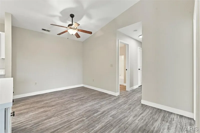 Dining Room with Vaulted Ceiling — 2415 Sandalwood Creek Court #E, Wildwood, MO 63038