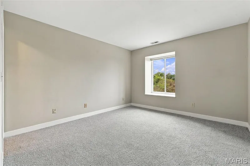 Primary Bedroom with new carpet — 2415 Sandalwood Creek Court #E, Wildwood, MO 63038