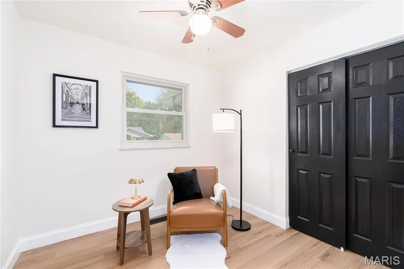 Light wood-finish flooring with white walls — 3025 Sherwood Lane, St Charles, MO 63301