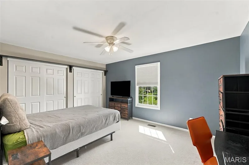 Recessed lighting, ceiling fan, carpet flooring, and a window with blinds — 8 Jacobs Place Court, O'Fallon, MO 63376