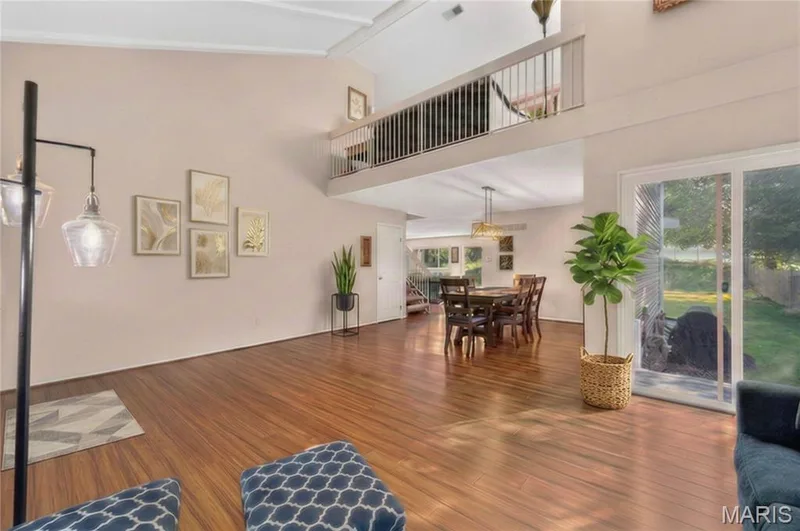 Large Open 2 Story Entry with Hardwood Floors & Living Space, Plus Backyard Access (plants & art are virtually added) — 25 Vicksburg Station, St Charles, MO 63303