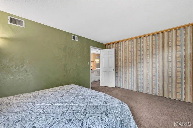 Upper Bedroom 1 with wall of closets. — 25 Vicksburg Station, St Charles, MO 63303