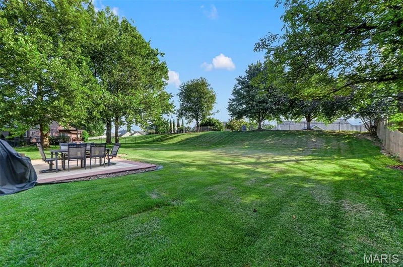 .54 acre lot. Ready to play with a custom patio & fully fenced! — 25 Vicksburg Station, St Charles, MO 63303