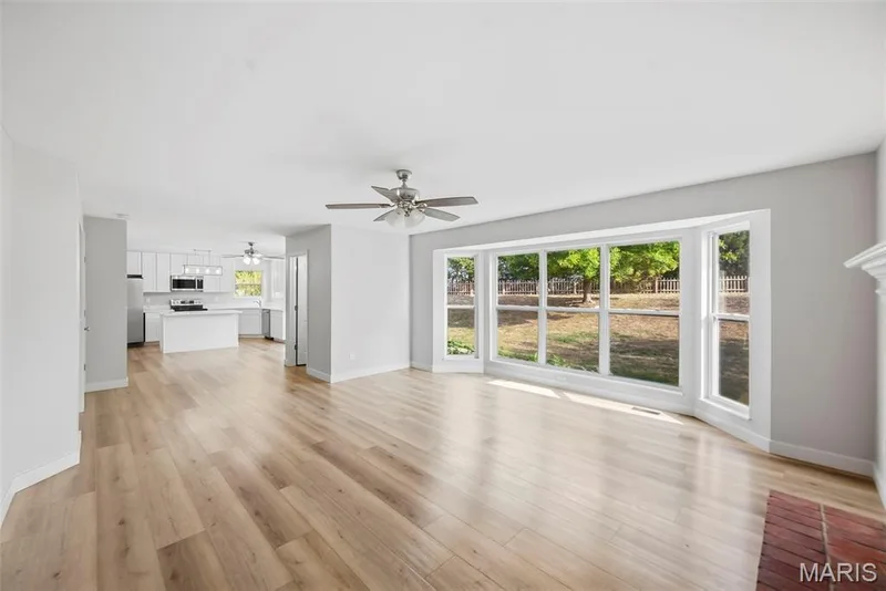 Living Room with 5 Window Bay — 1014 Wake Court, Wentzville, MO 63385