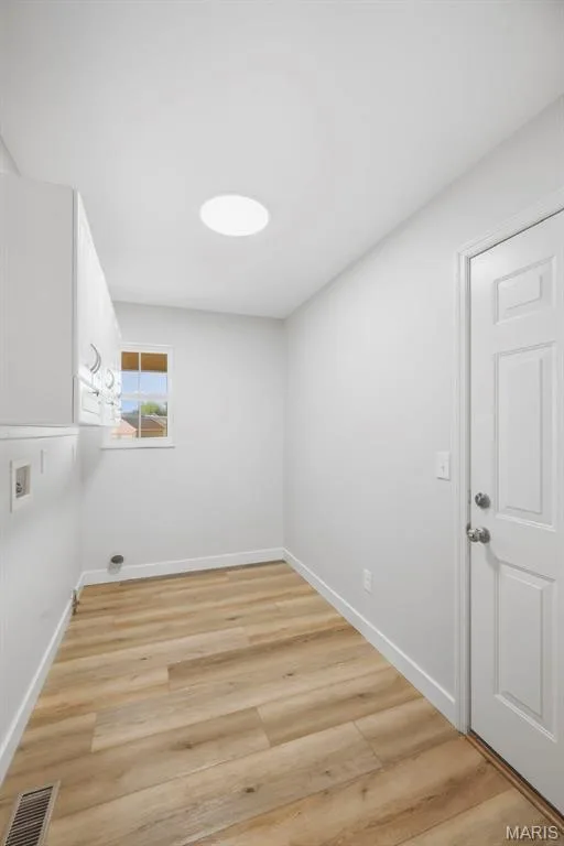Main Floor Laundry off Kitchen with access to garage. — 1014 Wake Court, Wentzville, MO 63385