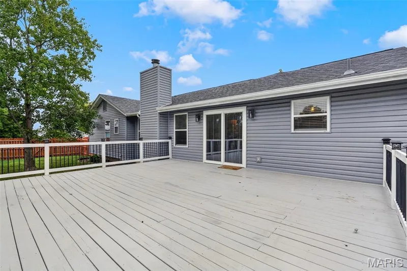 Enormous wood deck in backyard — 6401 Long Timber Drive, O'Fallon, MO 63368