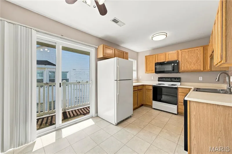 Kitchen and Breakfast Room — 450 Benton Drive #J, St Peters, MO 63376