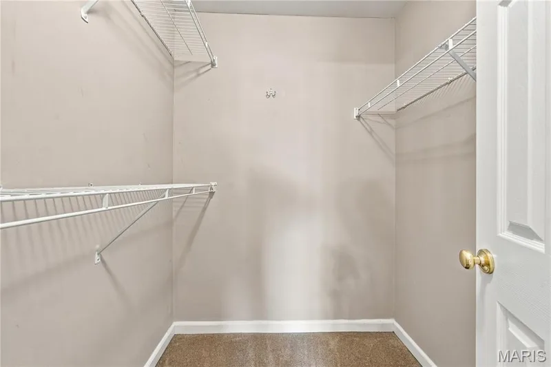 Primary Bedroom Walk-in Closet — 450 Benton Drive #J, St Peters, MO 63376