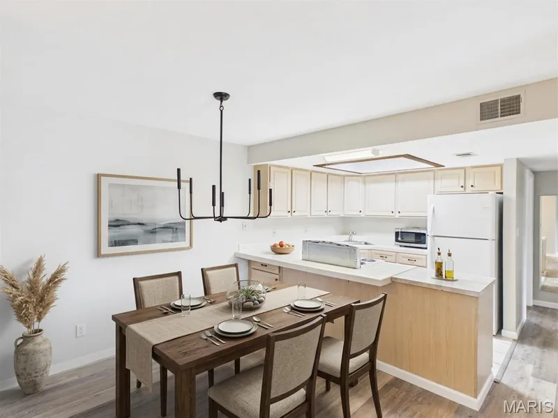 Virtually Staged Dining Area — 1436 Heritage Landing #22, St Charles, MO 63303