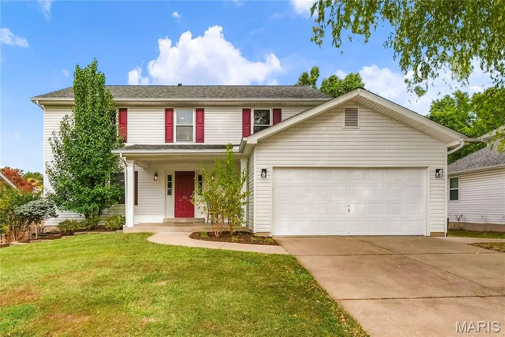 Two Story with Vinyl Siding, Architectural Shingles and Inviting Front Porch — 1645 Wild Goose Run, St Charles, MO 63303