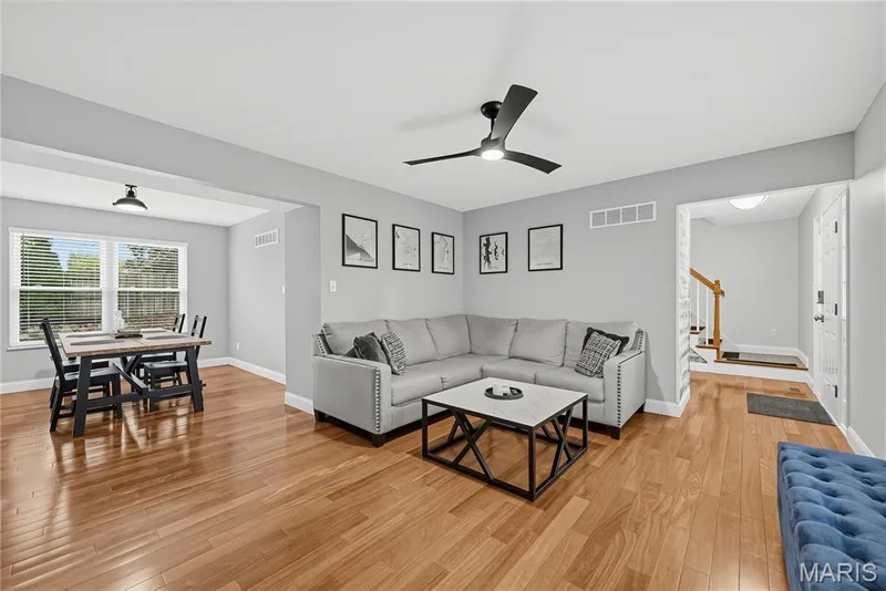 Living Room open to Entry Foyer and Dining Room — 1645 Wild Goose Run, St Charles, MO 63303
