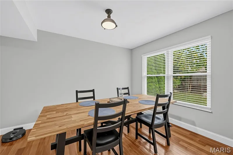 Dining Room with Engineered Hardwood Flooring — 1645 Wild Goose Run, St Charles, MO 63303