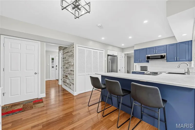 Breakfast Room and Kitchen with Breakfast Bar — 1645 Wild Goose Run, St Charles, MO 63303