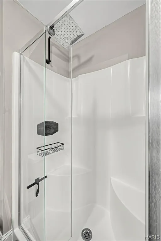 Shower with Seat in Primary Bath — 1645 Wild Goose Run, St Charles, MO 63303