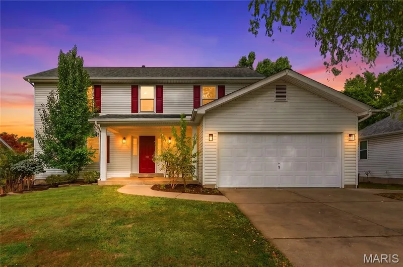Front Elevation at Dusk — 1645 Wild Goose Run, St Charles, MO 63303