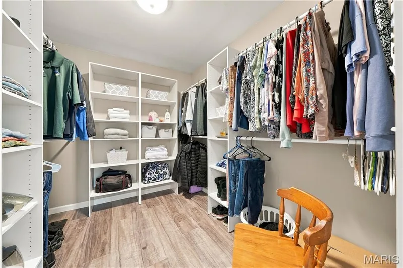 Luxury vinyl plank flooring, ceiling light, well organized and neutral decor. — 1417 Plantation Manor Court, St Peters, MO 63303