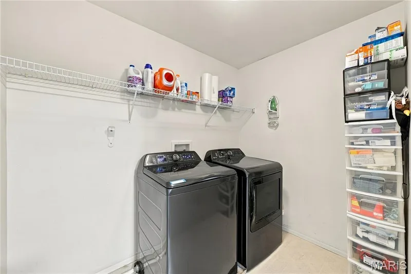 Vinyl flooring, wire shelving and washer pan. — 1417 Plantation Manor Court, St Peters, MO 63303