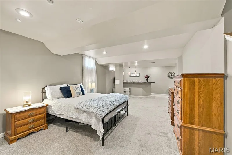 Carpeted flooring, recessed lighting, large space and neutral decor. — 1417 Plantation Manor Court, St Peters, MO 63303
