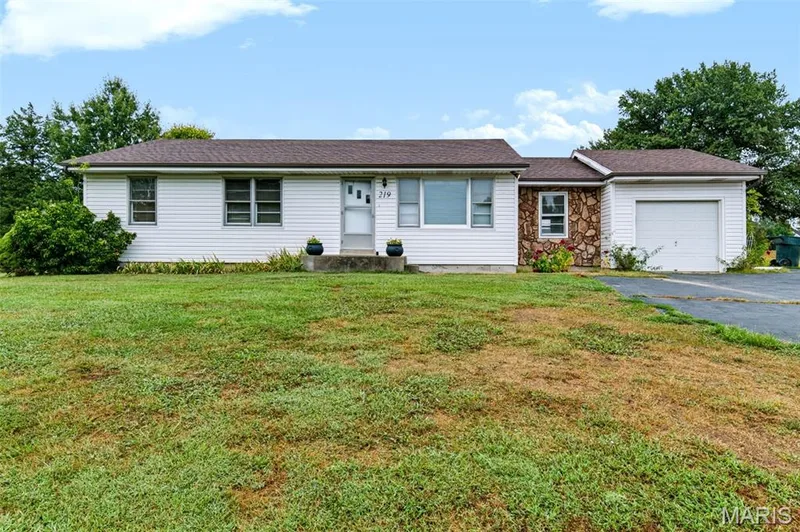 Charming ranch-style home on a spacious lot—classic, comfortable and ready for its next chapter! — 219 Mexico Road, Wentzville, MO 63385
