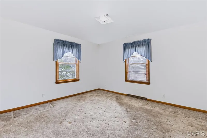 Primary Bedroom - 2 Closets - See Virtually Staged Picture for Inspiration - Hardwood Flooring under Carpet! — 219 Mexico Road, Wentzville, MO 63385