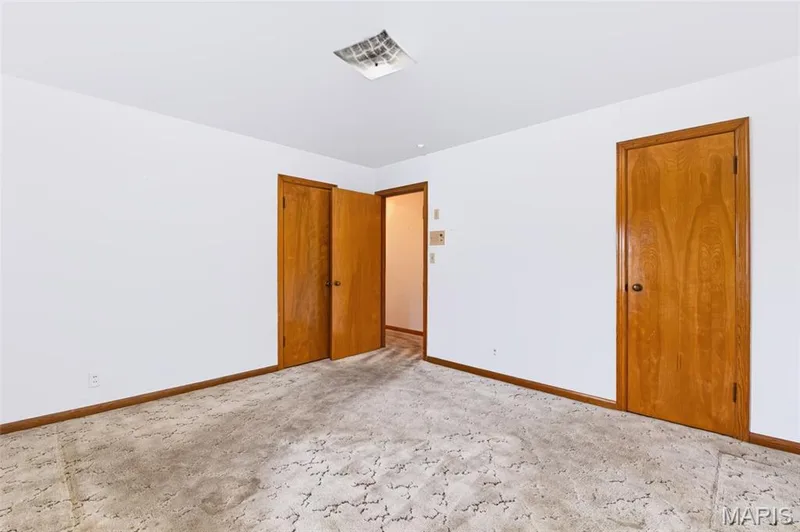 Primary Bedroom - 2 Closets - See Virtually Staged Picture for Inspiration - Hardwood Flooring under Carpet! — 219 Mexico Road, Wentzville, MO 63385