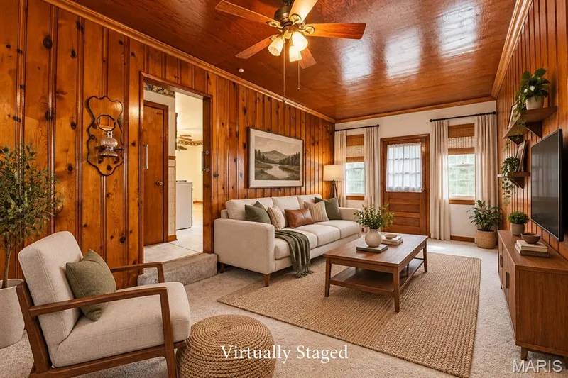 Virtually Staged Family Room off of the Kitchen and Garage - Would also make a nice Home Office or anything your heart desires - Living Room and Family Room on the Main Level of the Home! — 219 Mexico Road, Wentzville, MO 63385