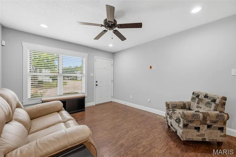 Front Entry and Living Room with Laminate Flooring — 3248 Meadow Trail Drive #75, St Peters, MO 63376