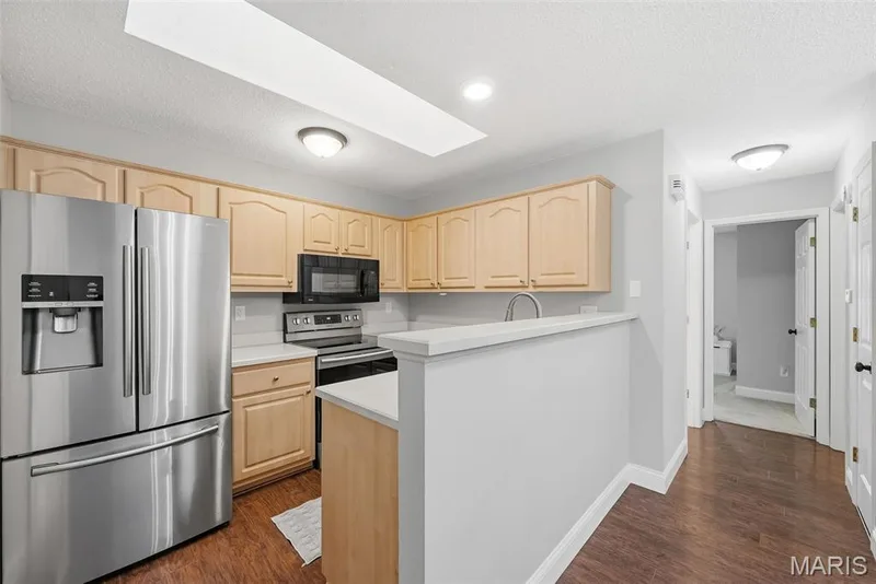 Kitchen with Stainless Steel Appliances — 3248 Meadow Trail Drive #75, St Peters, MO 63376