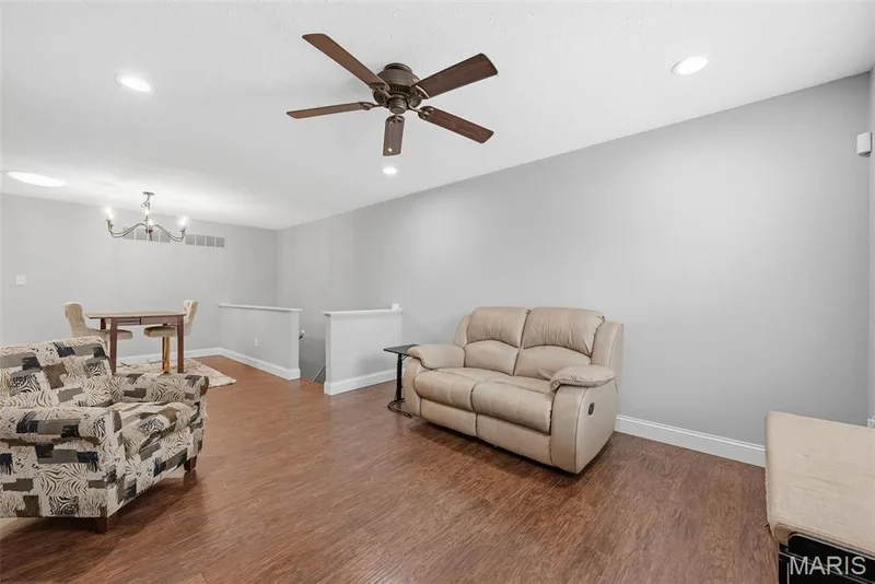 Living Room and Dining Area with Laminate Flooring — 3248 Meadow Trail Drive #75, St Peters, MO 63376