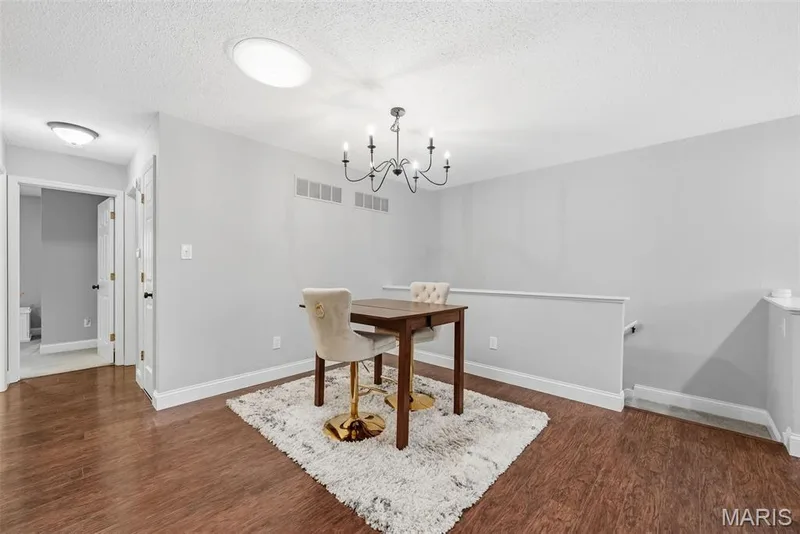 Dining Area and Staircase to Finished Lower Level — 3248 Meadow Trail Drive #75, St Peters, MO 63376