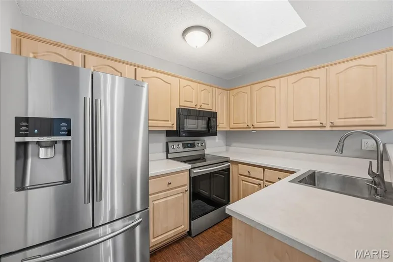 Stainless Steel Appliances, Refrigerator, Smooth Top Electric Range, Microwave and Dishwasher — 3248 Meadow Trail Drive #75, St Peters, MO 63376