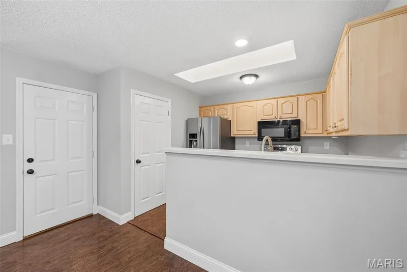 Kitchen with Skylight — 3248 Meadow Trail Drive #75, St Peters, MO 63376