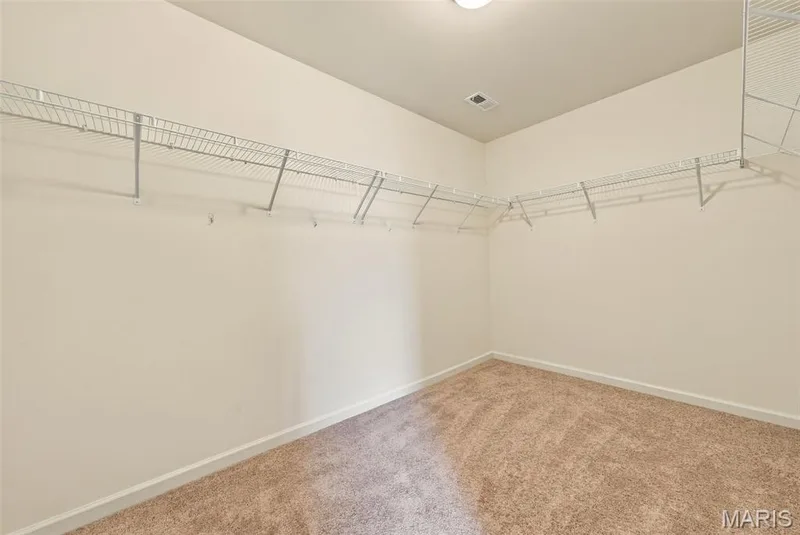 walk-in closet — 104 Baycrest Court, St Charles, MO 63301