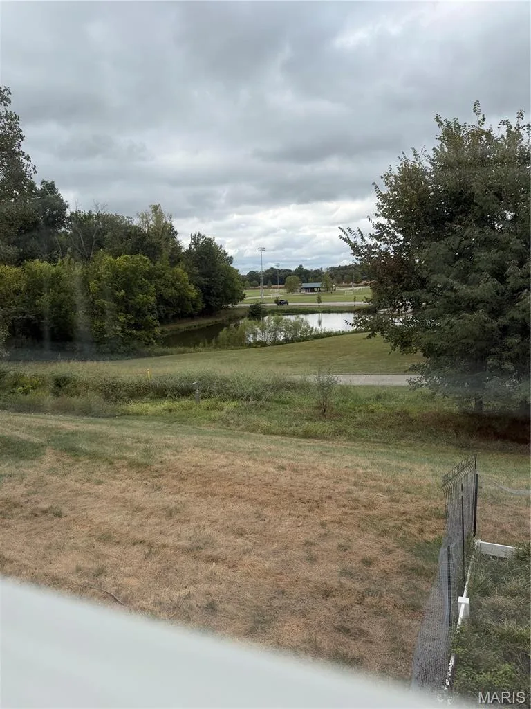Walking trail and pond looking from back deck. — 2151 Orchid Blossom Court, St Peters, MO 63376