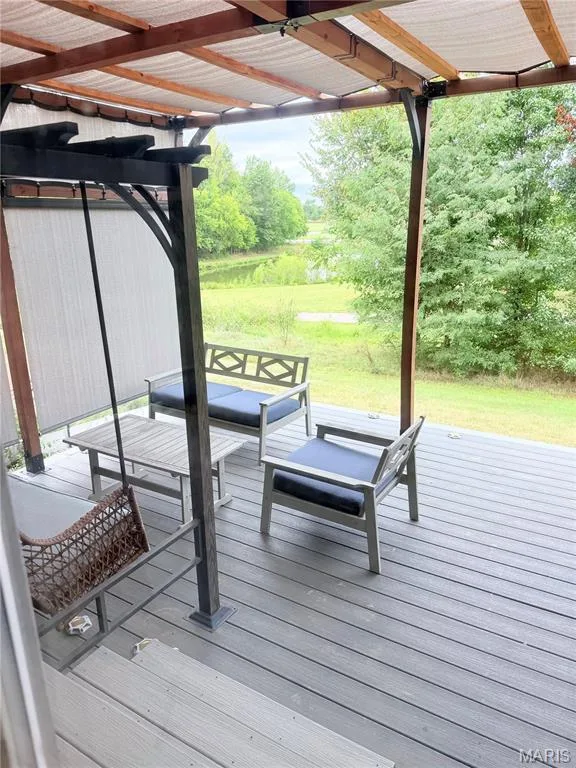 Back deck looking to the pond. — 2151 Orchid Blossom Court, St Peters, MO 63376
