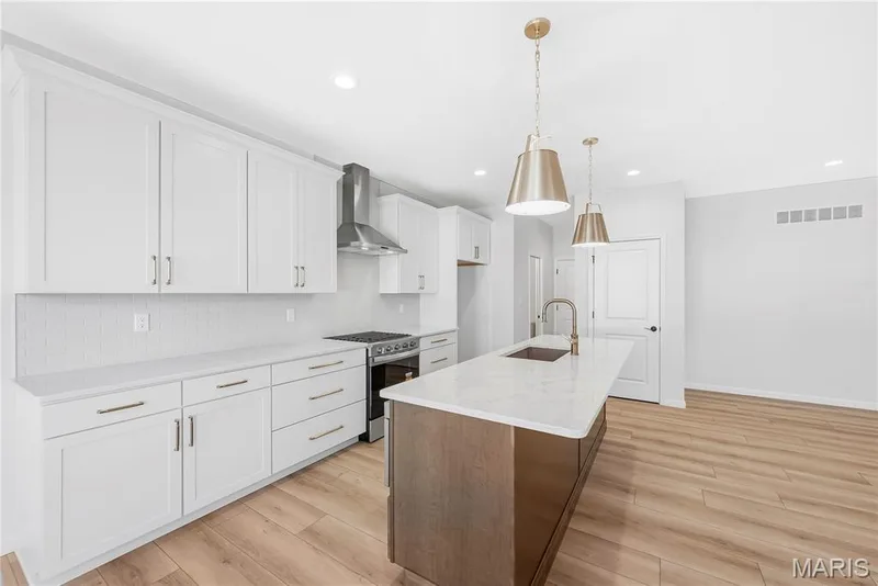 Large Kitchen Island with Seating Bar — 53 Pheasant Ring Drive, St Peters, MO 63376