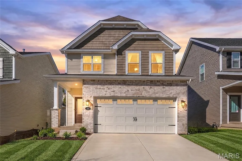 Front Elevation at Dusk — 53 Pheasant Ring Drive, St Peters, MO 63376