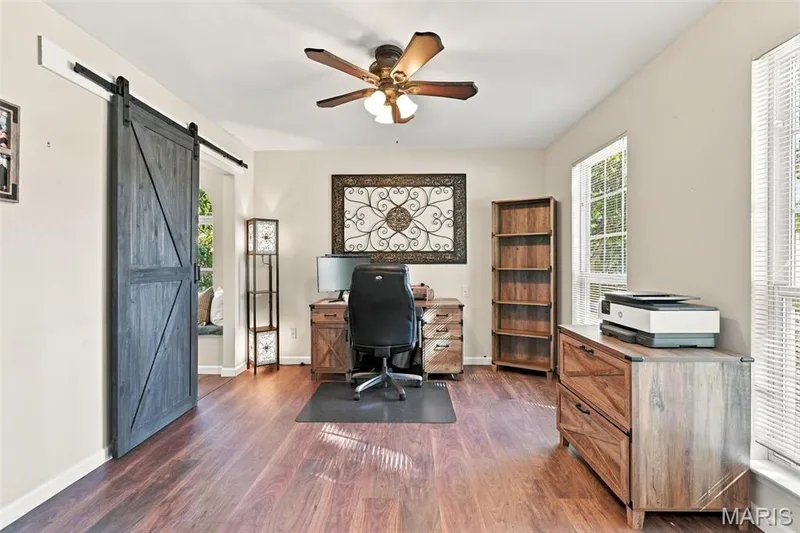 Main floor "home office" with pass through to sitting area off Family Rm — 5872 Wellington Farm Drive, St Charles, MO 63304
