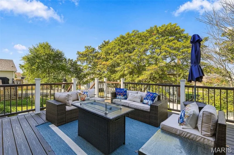 New Maintenance Free Deck off kitchen...relax and enjoy some of the most beautiful sunsets — 5872 Wellington Farm Drive, St Charles, MO 63304